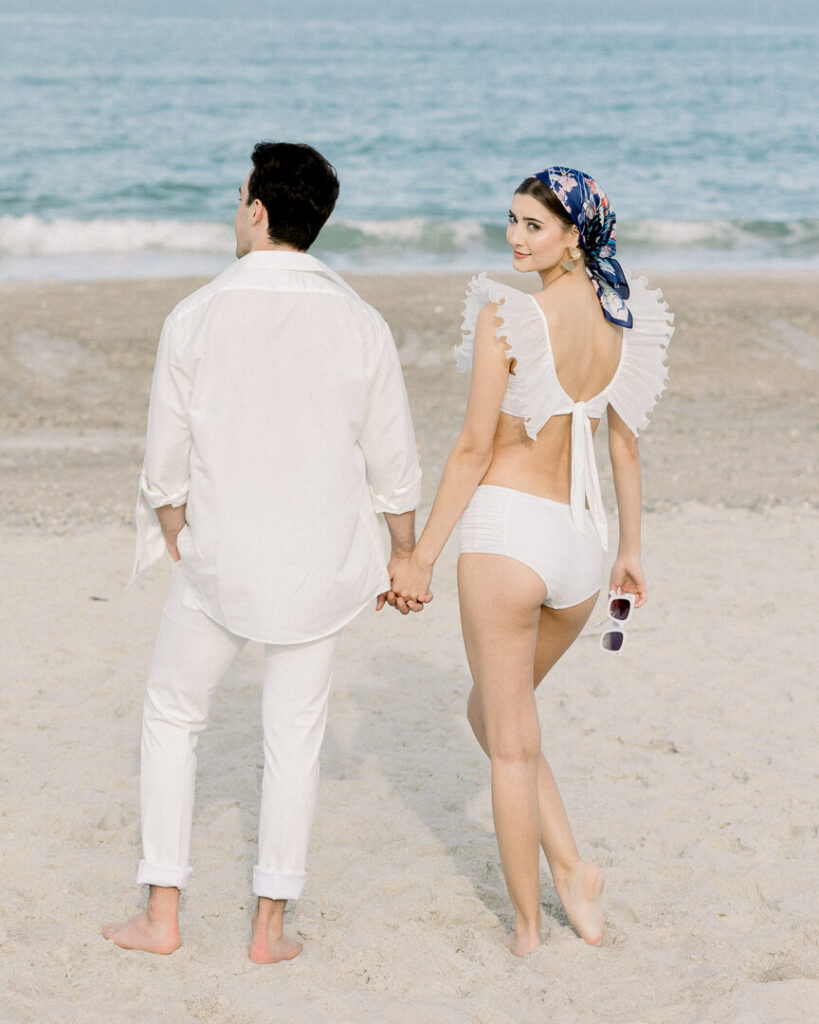 couple beach engagement in Bikinis Ruffles Top and retro sunglasses