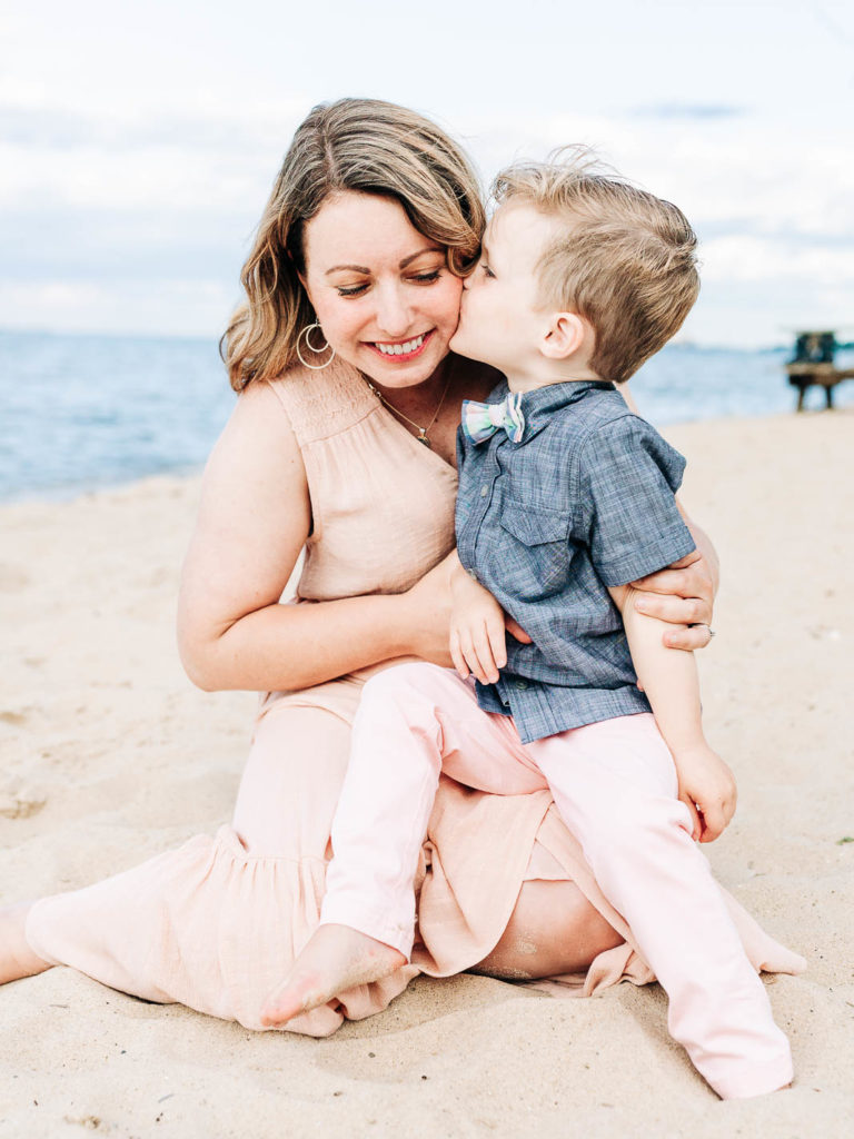 toddler kissing mom summer beach family session