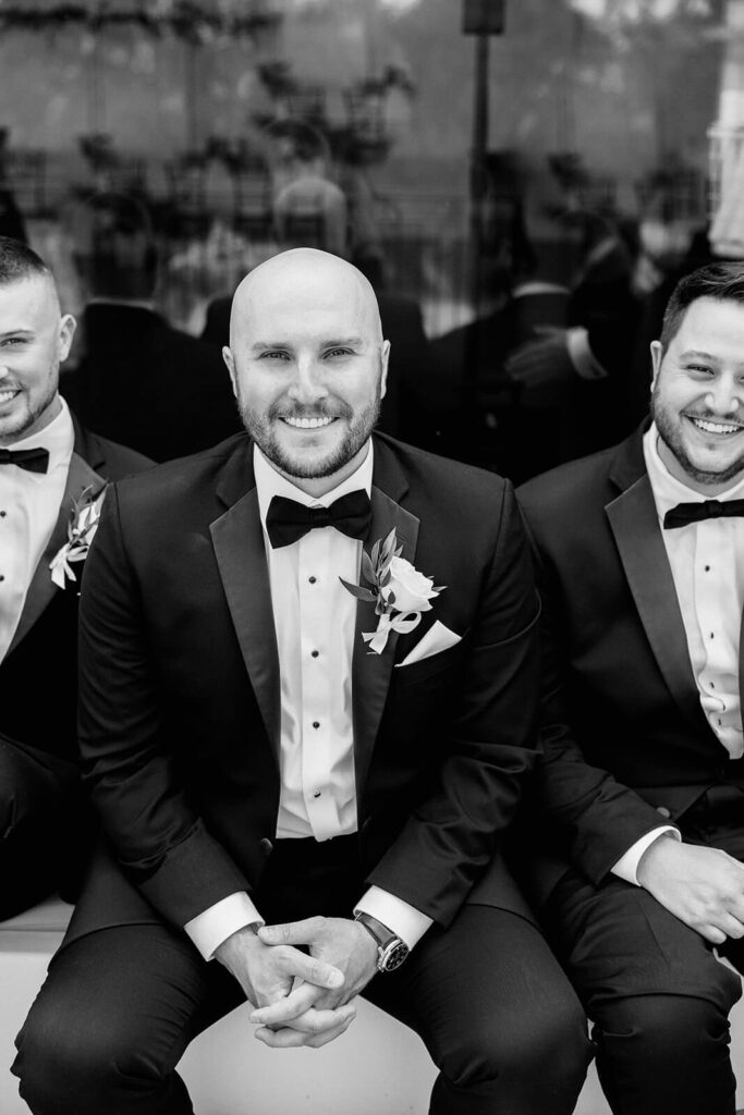 black and white groomsmen portrait at The Grosse Pointe War Memorial