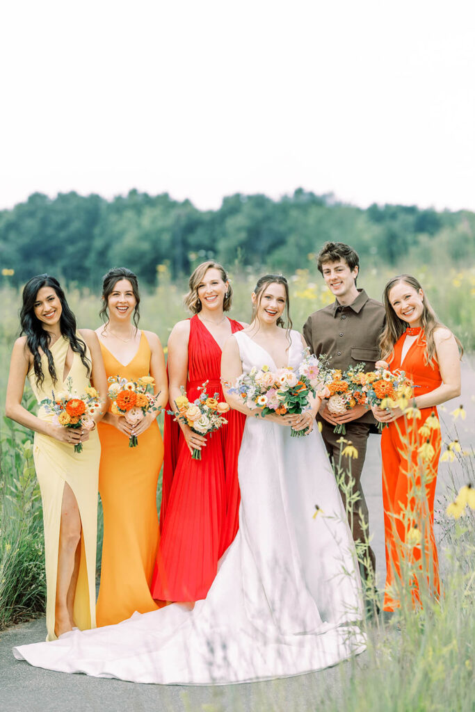 bride with bridesmaids and bridesman in multi-colored dresses4