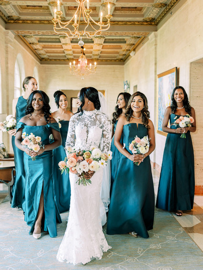 Nigerian wedding bride with bridesmaids in dark green dresses