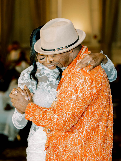 Nigerian bride and dad dancing in traditional attire at Inn at St. John's