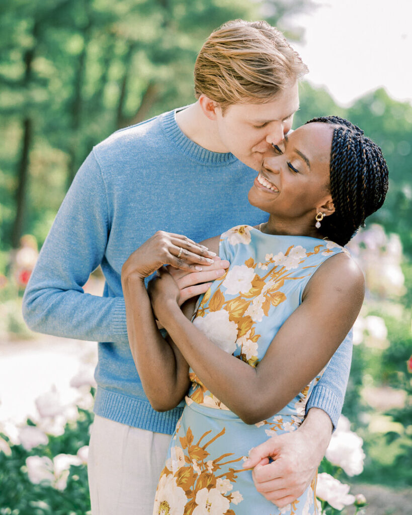 Nichols Arboretum Engagement session couple kissing on cheek