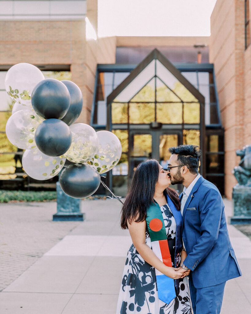 multiculutral couple engagement session on campus with balloons2