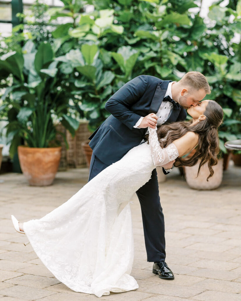Planterra Conservatory wedding photo groom kiss bride