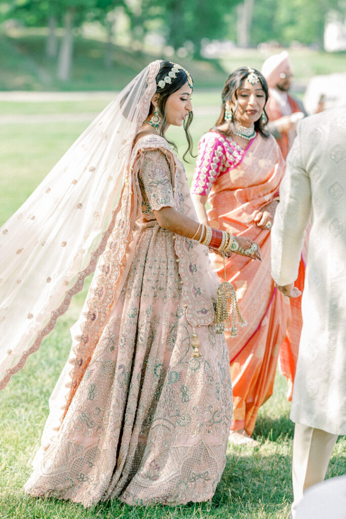 Detroit Indian Wedding Film Photographer walking down the aisle