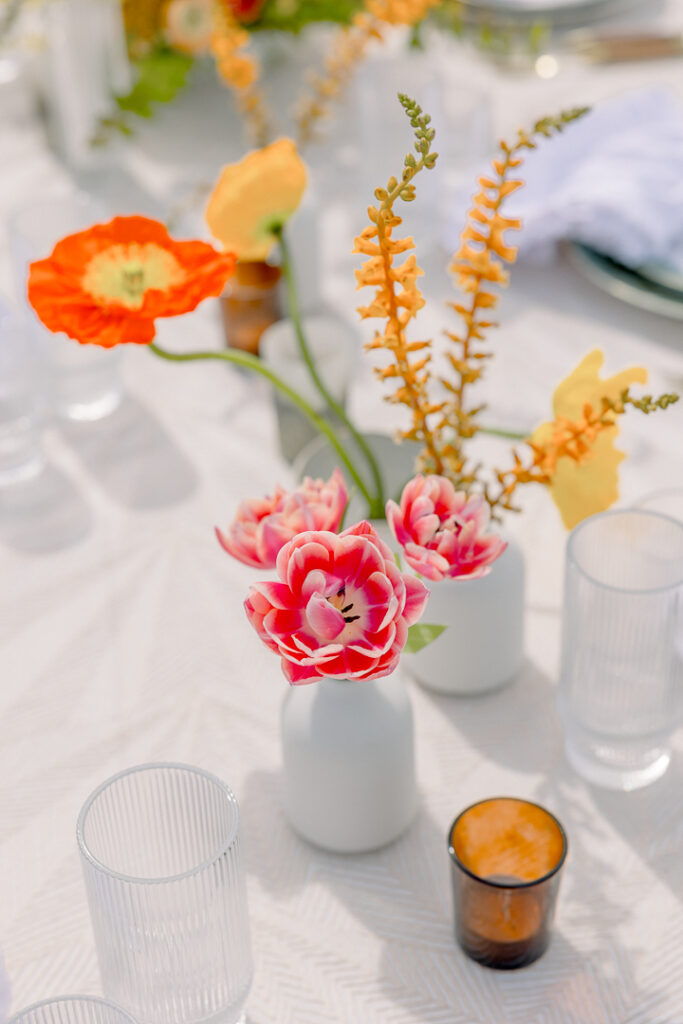 summer floral centerpiece in orange and peach detail shots