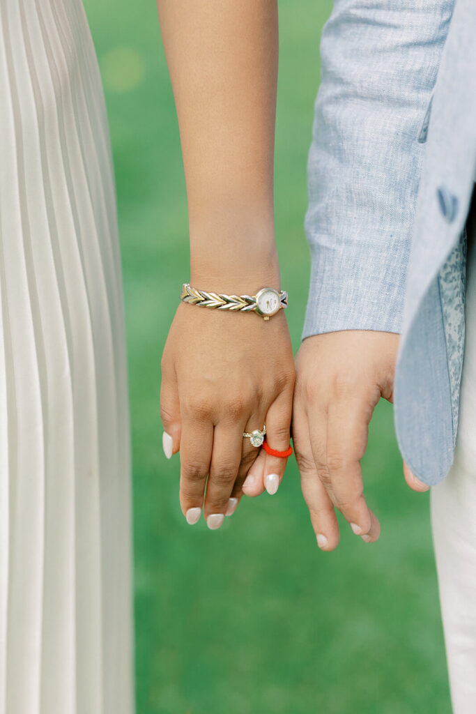 red thread of fate couple hand engagement session